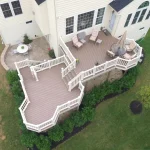 Custom backyard composite deck built by Get Decked